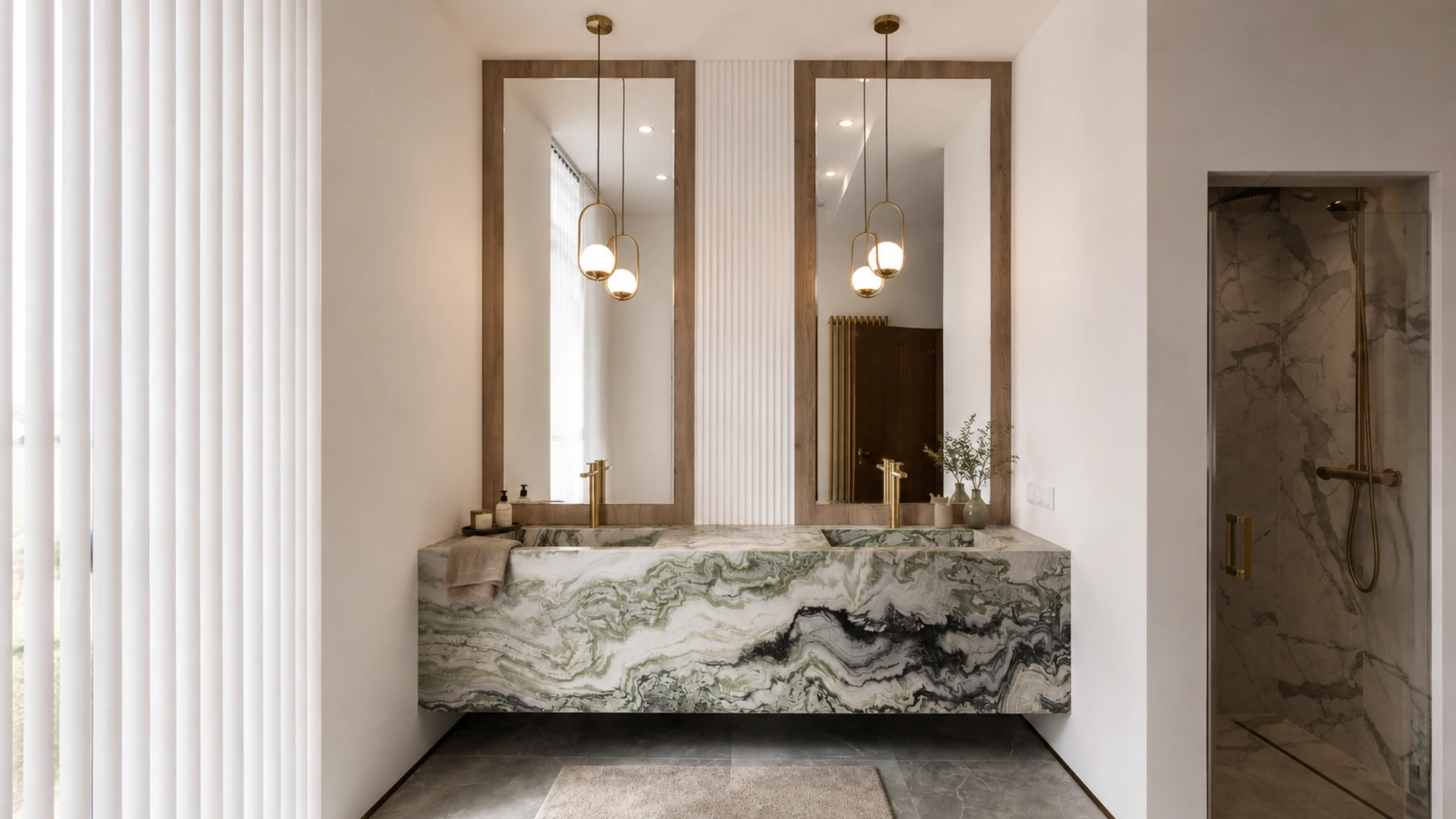 Wall-mounted double vanity in green and white stone with two tall mirrors.