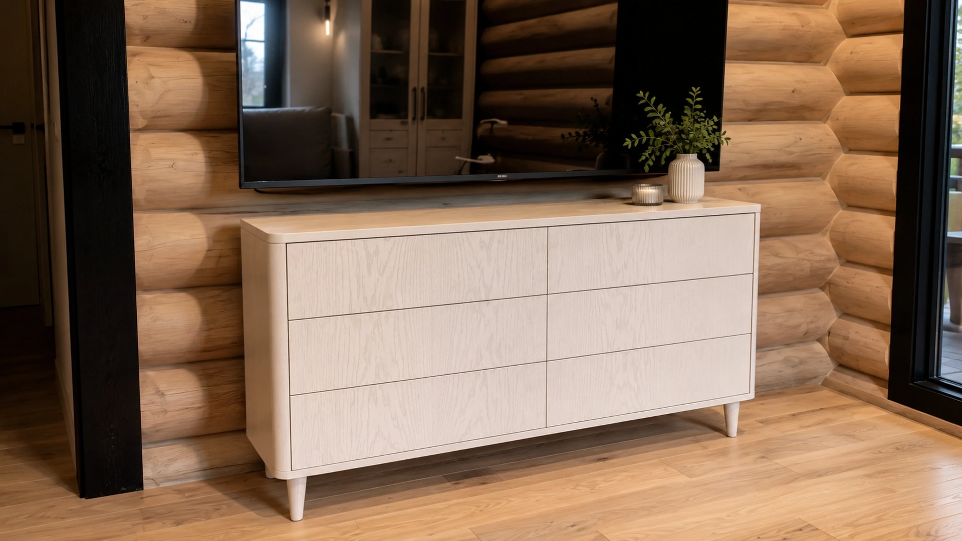 White dresser in a log cabin